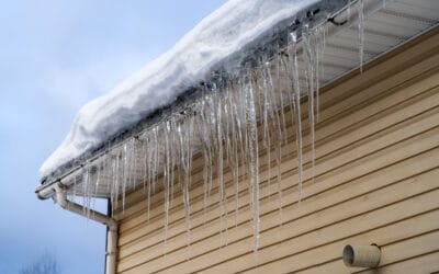 How Gutter Guards Help Prevent Ice Dams and Winter Water Damage